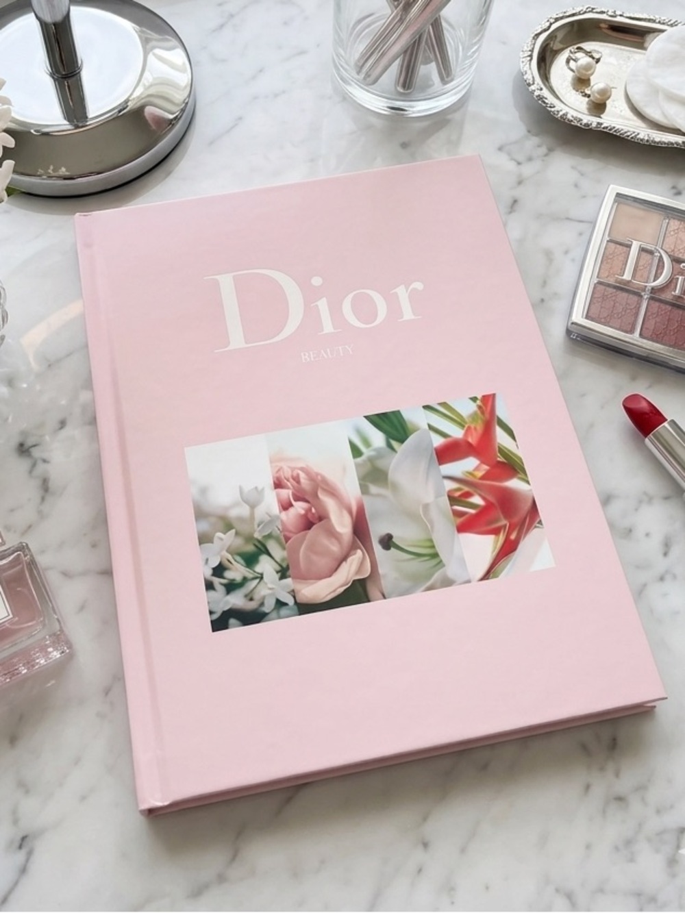 Dior pink beauty book with floral panel